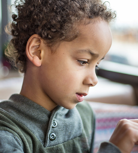Boy Reading Tablet