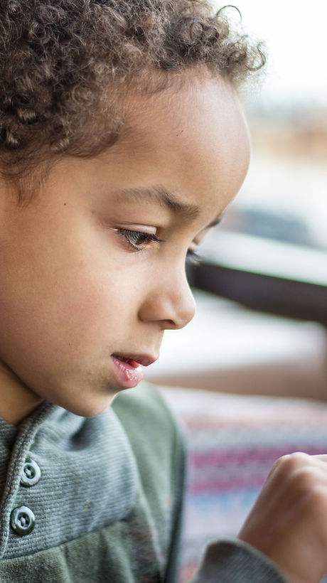 Boy Reading Tablet