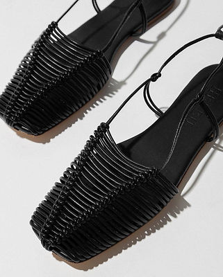 detail of black leahter luxury sandal