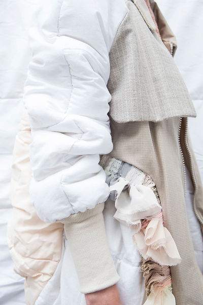 close up of puffer coat made from recycled duvets and fabrics by J-ANT