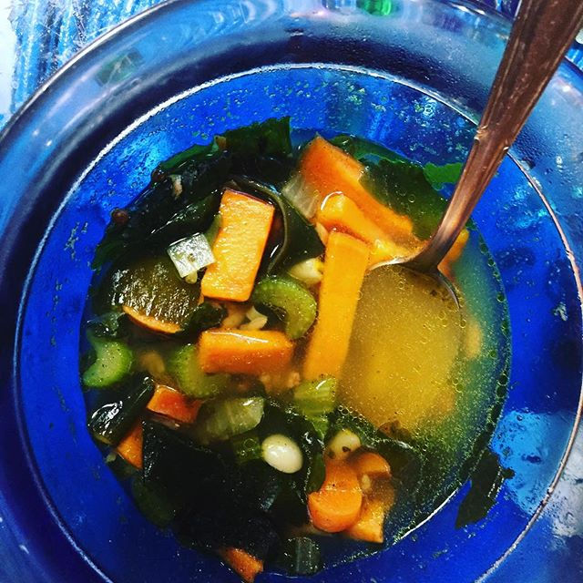 Close-up view of a colorful bowl of fresh vegetables and grains