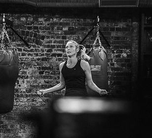 woman in black fitness top doing training_edited.jpg