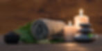 Candles and a towel for massage therapy