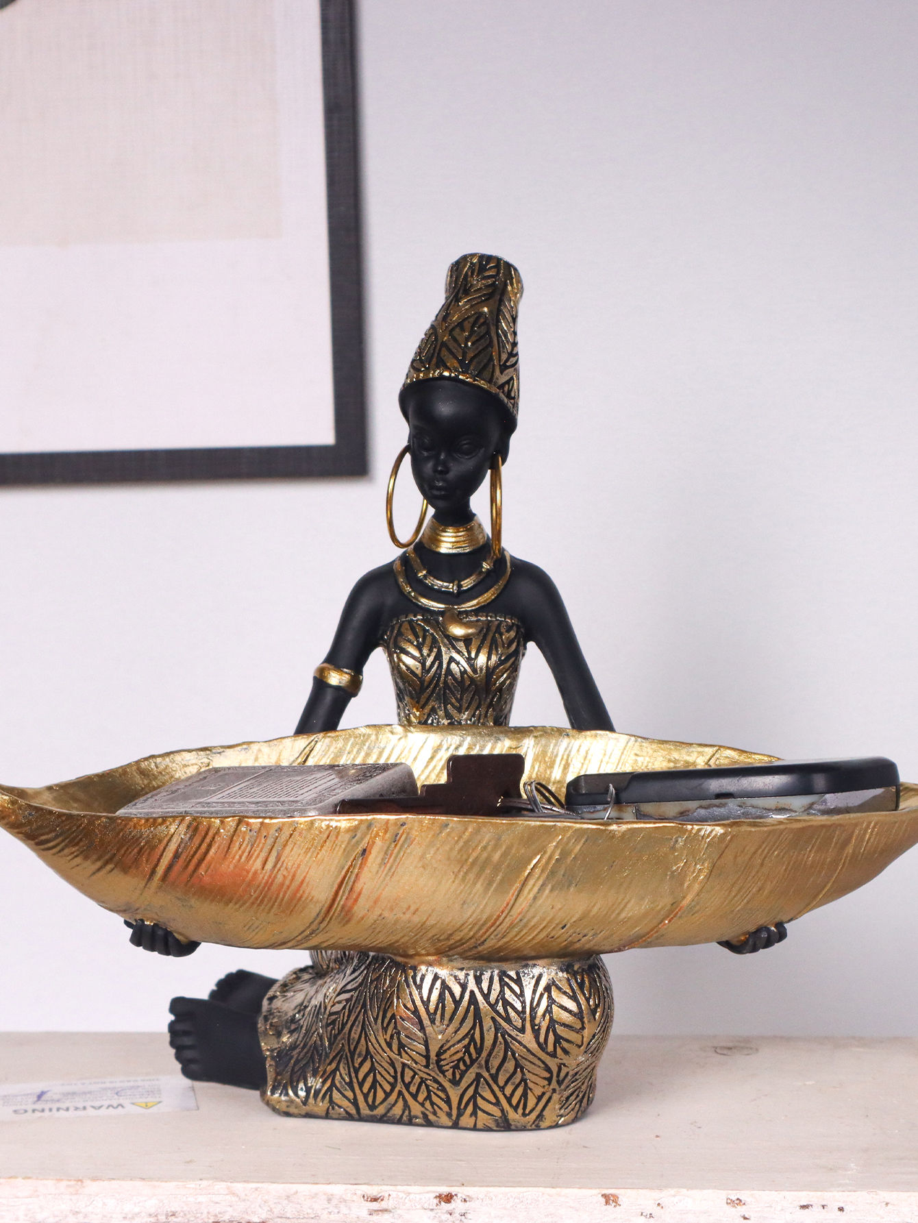 African Girl Holding a Plate Sculpture