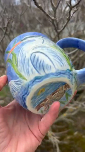 Thumbnail: Great blue heron mugs (white $175 and Heron w/ cat $260)
