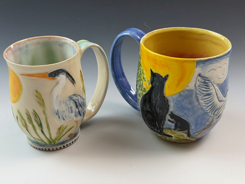 Thumbnail: Great blue heron mugs (white $175 and Heron w/ cat $260)