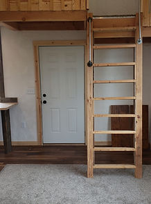 living room and ladder of the tiny house.