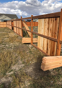 Building fence in Gallatin heights subdivision.