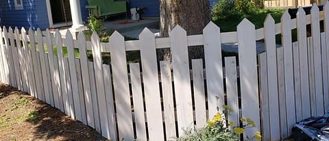 White stained custom fence finished.