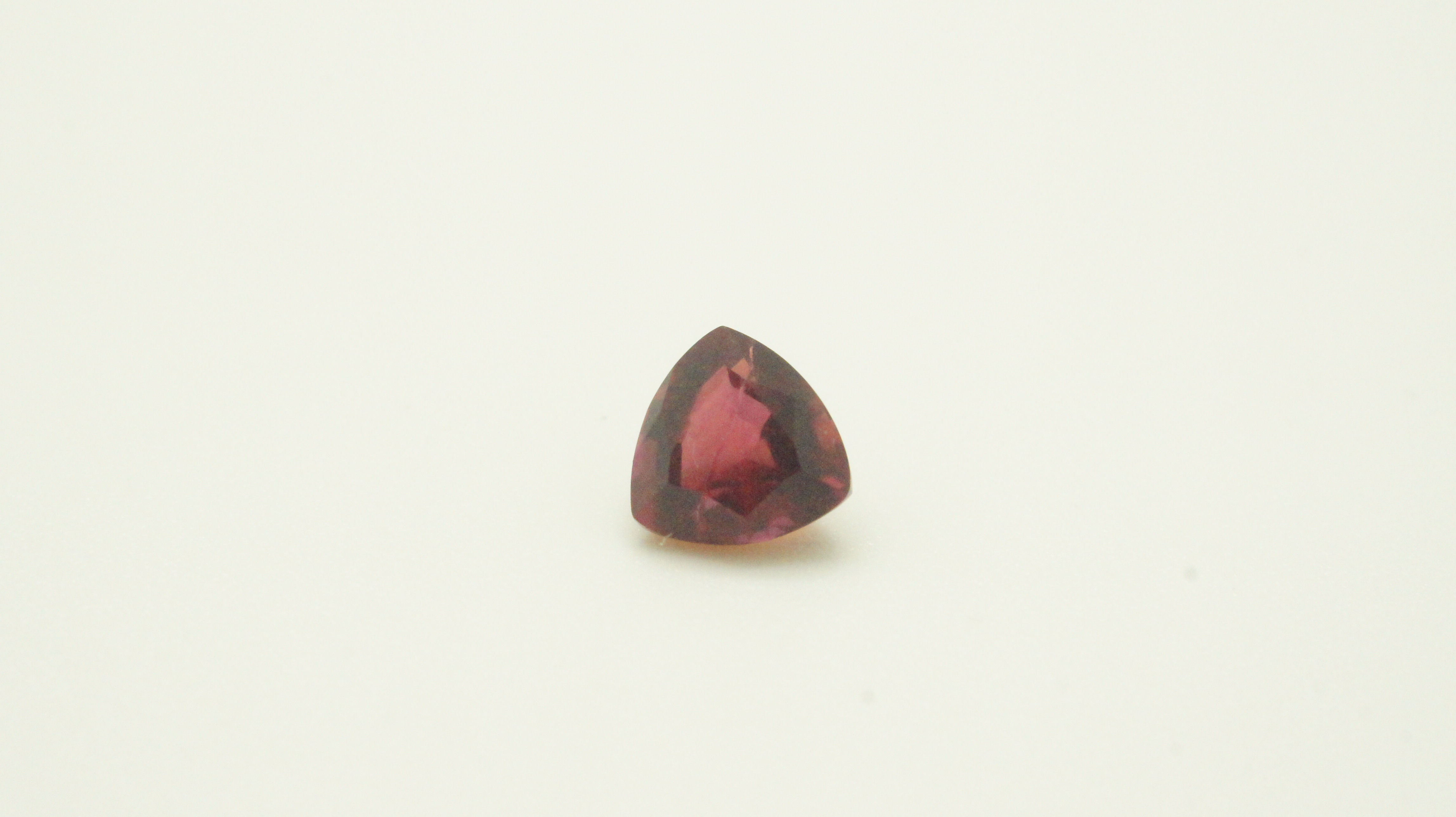 Hydrothermal Red Beryl, Trillion 6x6 mm, Weight 0.71 cts