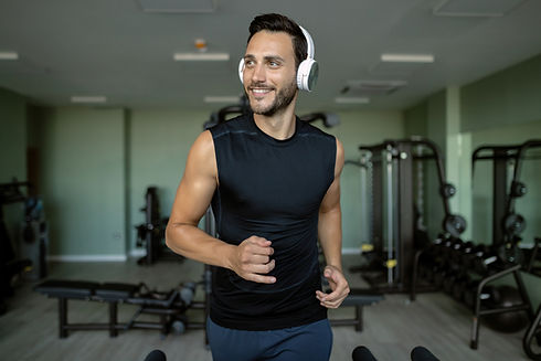 young-happy-athlete-jogging-on-running-track-in-he-2022-10-06-01-42-39-utc.jpg