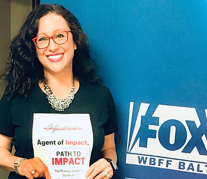 Wendy with her book, on set at Fox 45