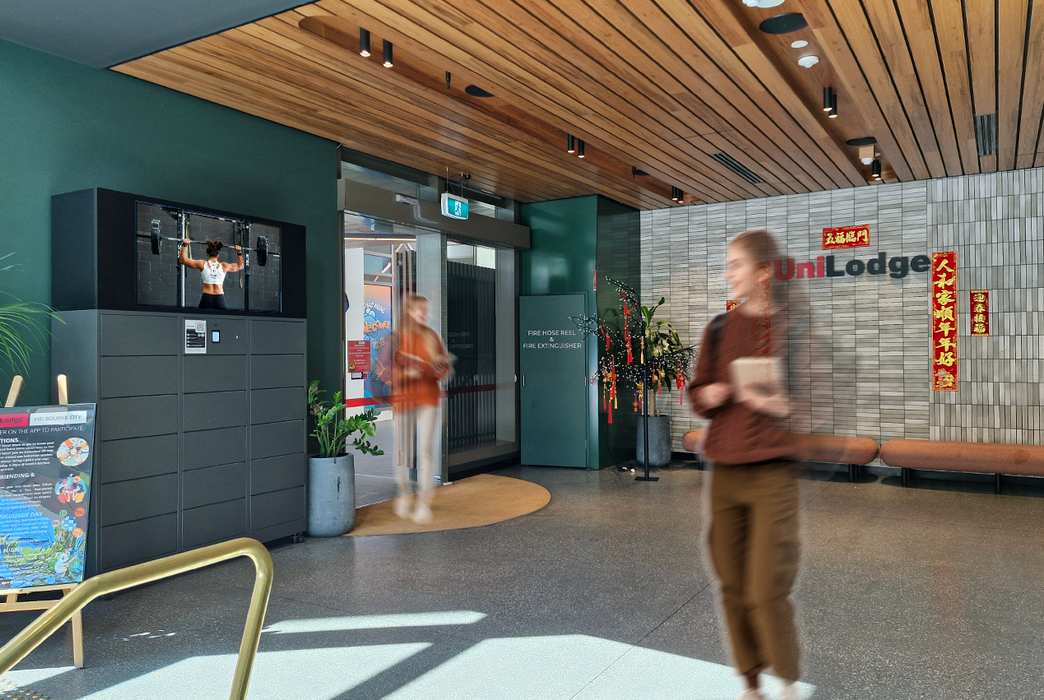 People walking past a MT17 smart locker