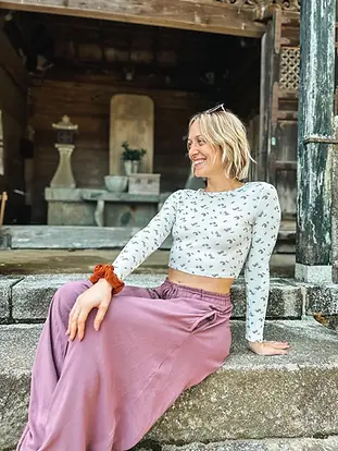 Couple watching a tropical sunset on Little Corn Island during the Awaken in Paradise Spring Renewal Retreat at The Lighthouse Retreat.