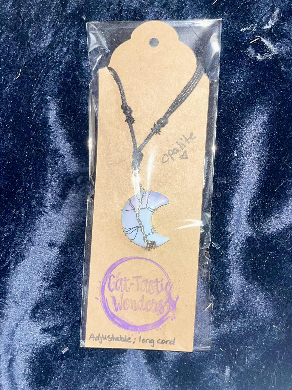 Thumbnail: Moon crystal pendant necklace, adjustable black cord, In-Tune Boutique brand, gemstone.