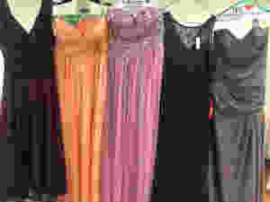 A few of the dresses collected for 'Project Prom Dress' in various colors and styles.