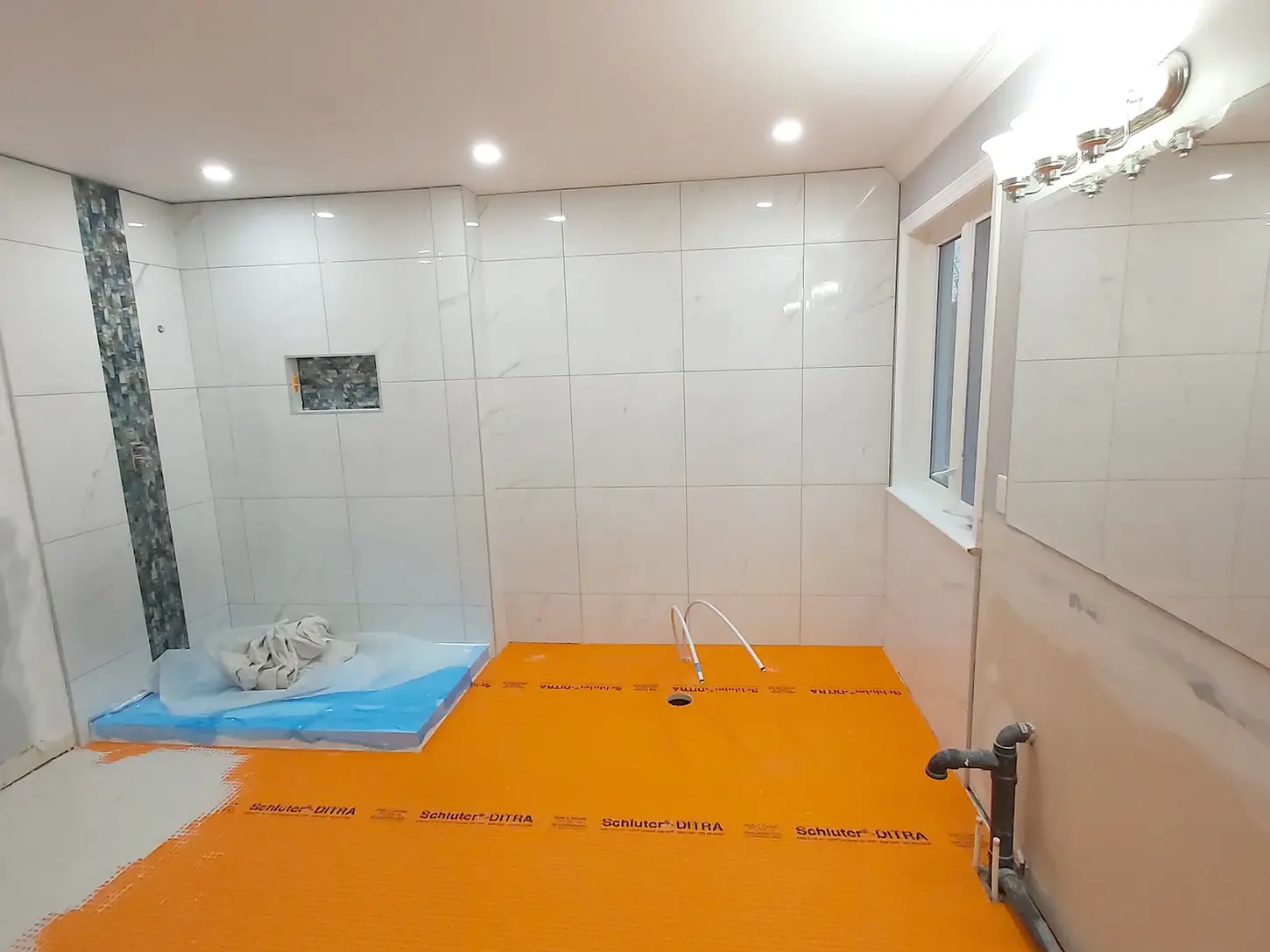 Schluter Ditra floor waterproofing membrane shower installation