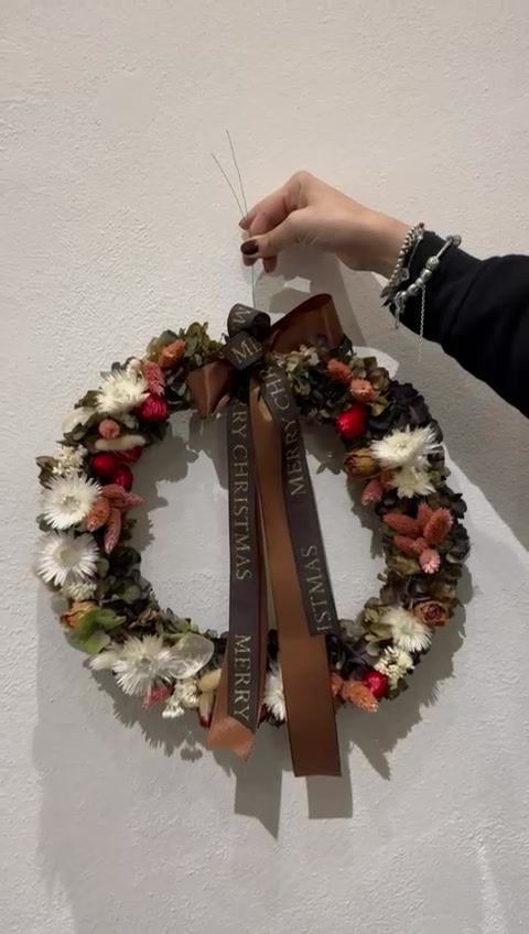Miniatura: Ghirlanda di fiori secchi sui toni marroni