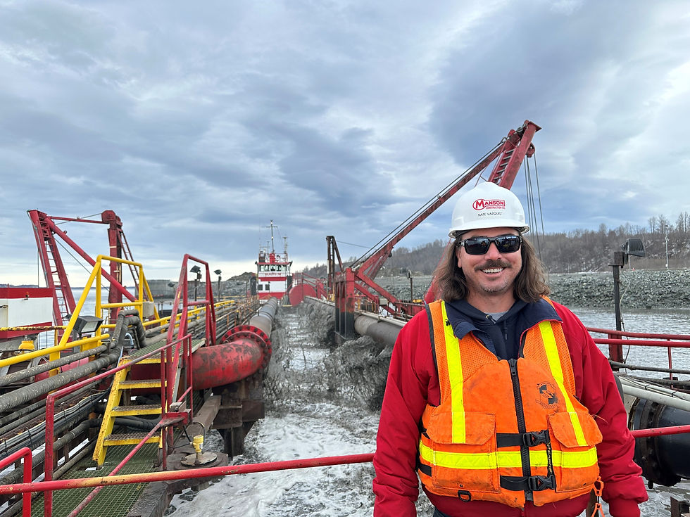 A man on a hopper dredge