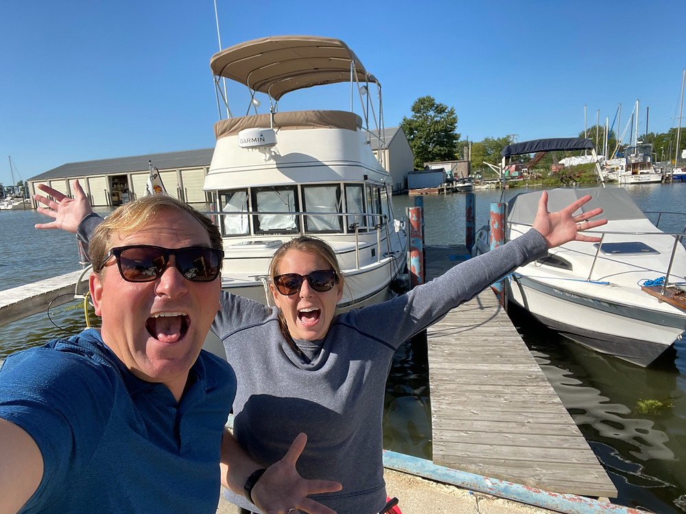 couple on perfect great loop boat camano 31 trawler