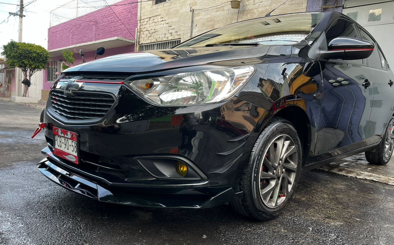 Lip delantero negro gloss para Aveo 18-23 en plástico