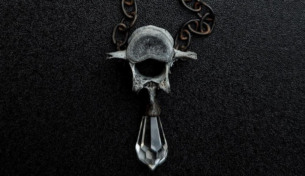 Raccoon Vertebra Crystal Prism