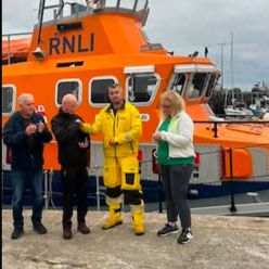 Arranmore RNLI Coxswain Kieran O'Donnell presents RNLI Long Service Medals to Mick Donaghy (30 years) and Triona Bonner (20 years), pictured with members of the volunteer lifeboat crew and the Burtonport RNLI Fundraising Committee following the station's weekly training exercise.