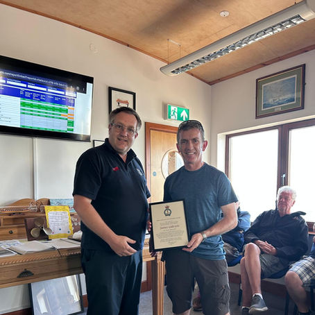 James Gillespie receives Award from Captain Byron Griffiths