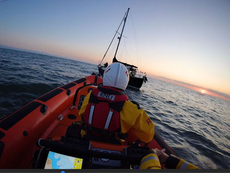 Early morning response for Skerries RNLI — Louis Simson approaches the casualty yacht off the north Dublin coast as the sun rises.