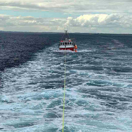 Fishing vessel under tow