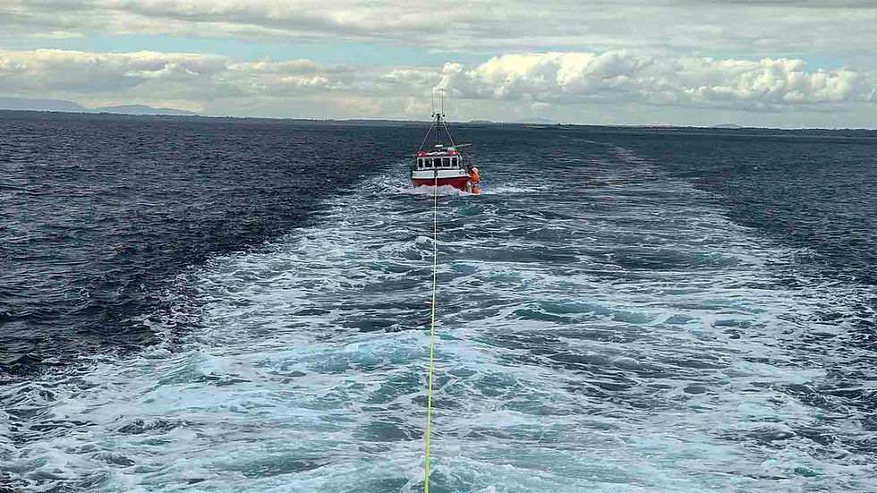 Fishing vessel under tow