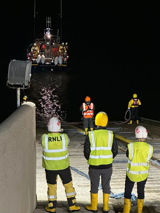 Newcastle RNLI's shore crew watch their all-weather lifeboat at the slip. Photo Credit: RNLI/Newcastle