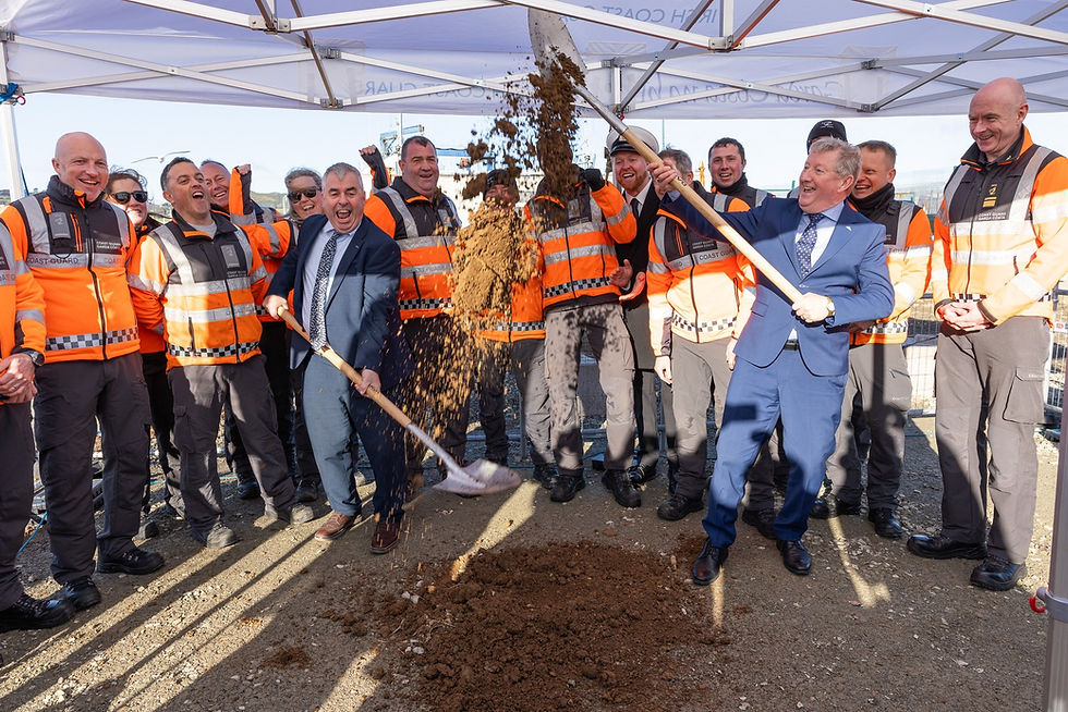 Minister Seán Canney and Minister Kevin Boxer Moran turning the sod with members of the Greystones Coast Guard unit
