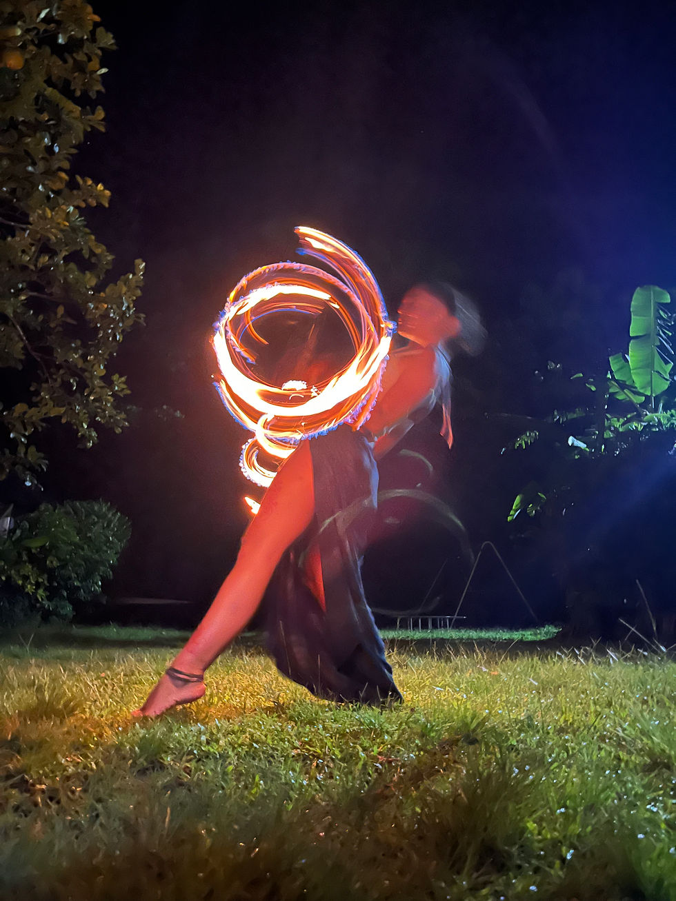 Clara Free Spirit flow and dance with her fire dragon staff