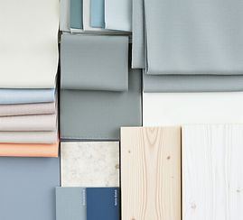 soothing, desaturated blue, gray, and sage fabric swatches in various textures and pattern