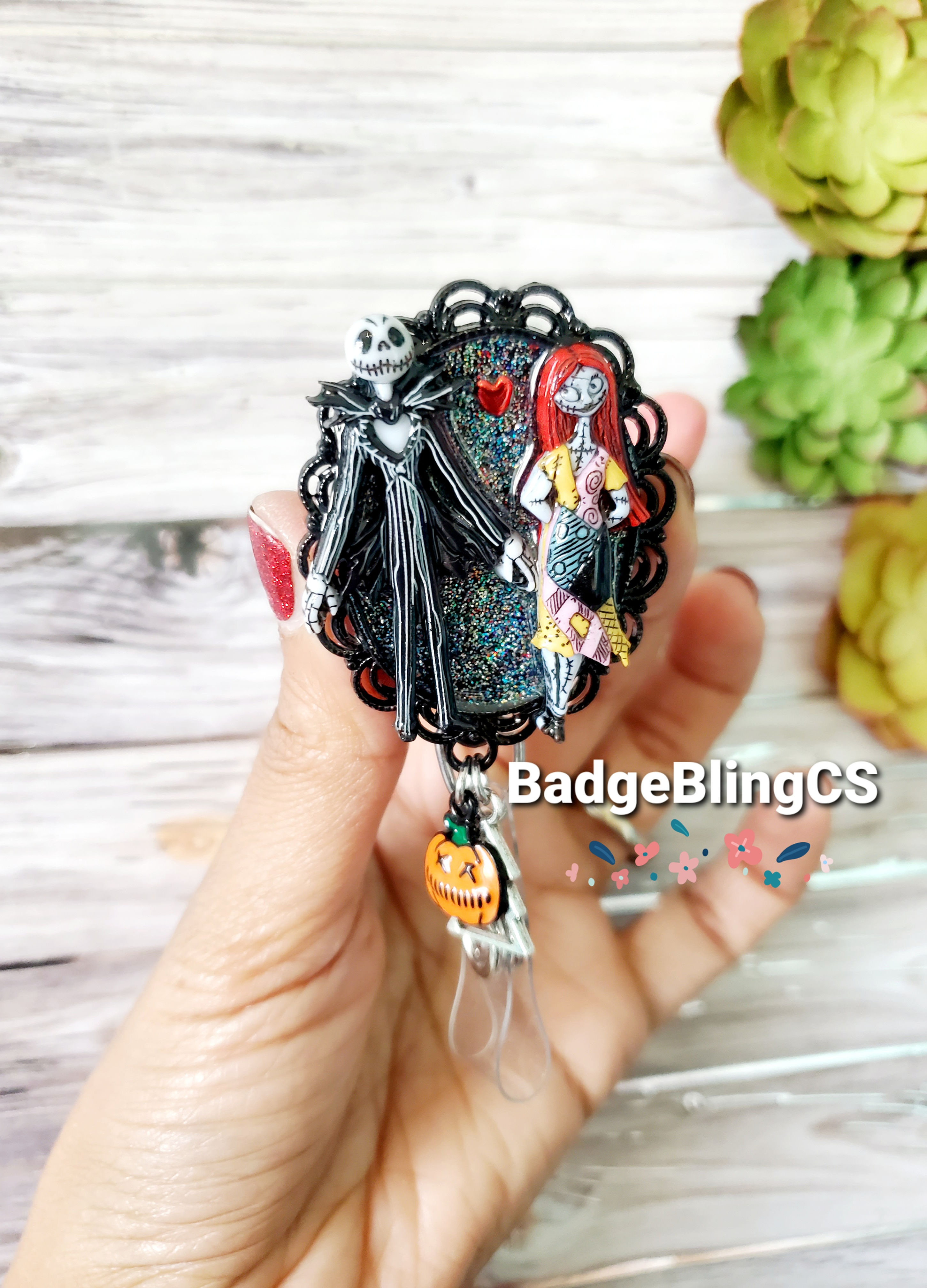 Nightmare before christmas badge holder jewelry.  Jack and Sally in love