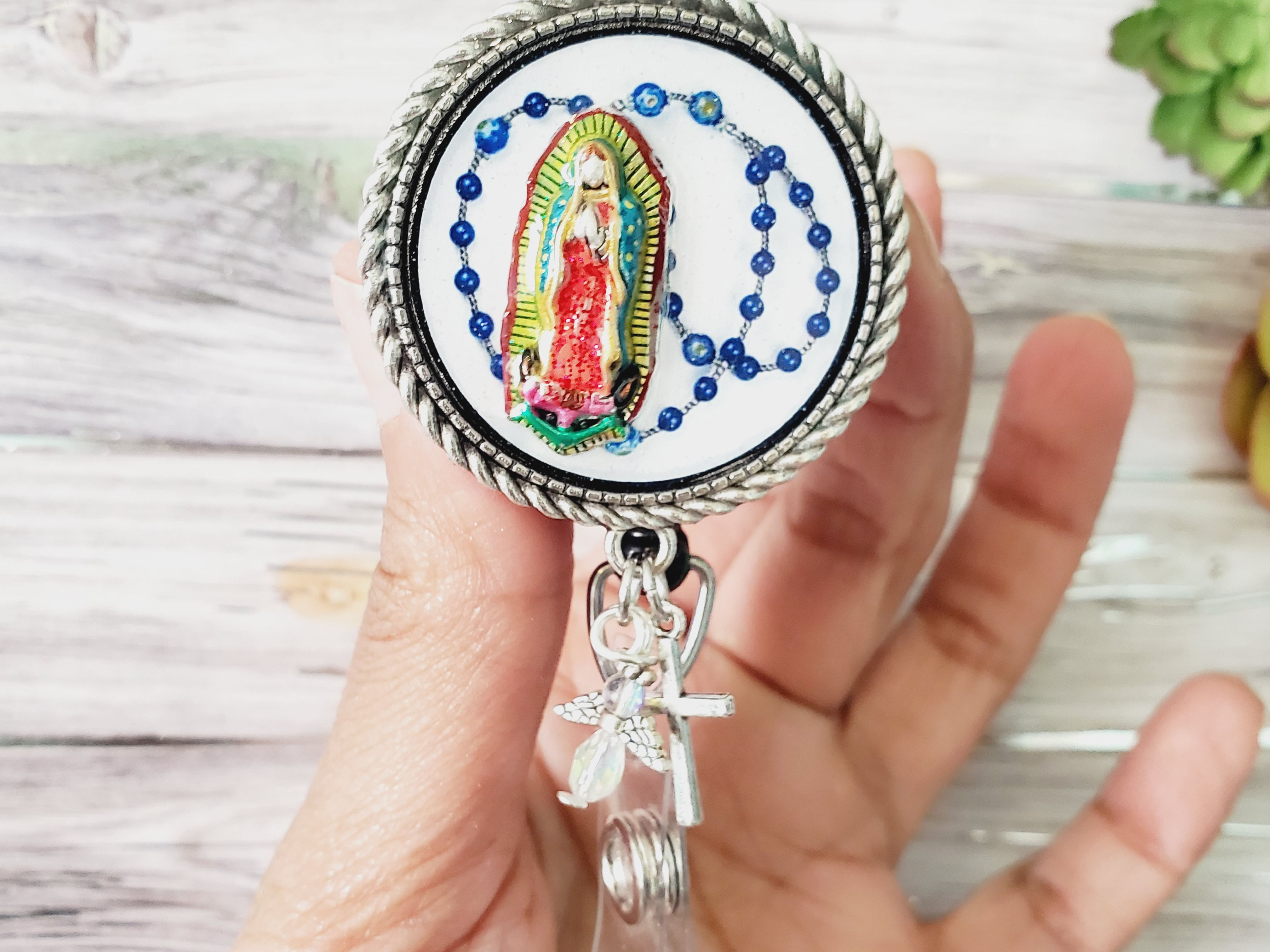 Our lady Guadeloupe badge jewelry.  Hand painted