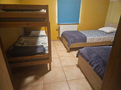 Vierpersoonsslaapkamer met Tempur bedden en stapelbed