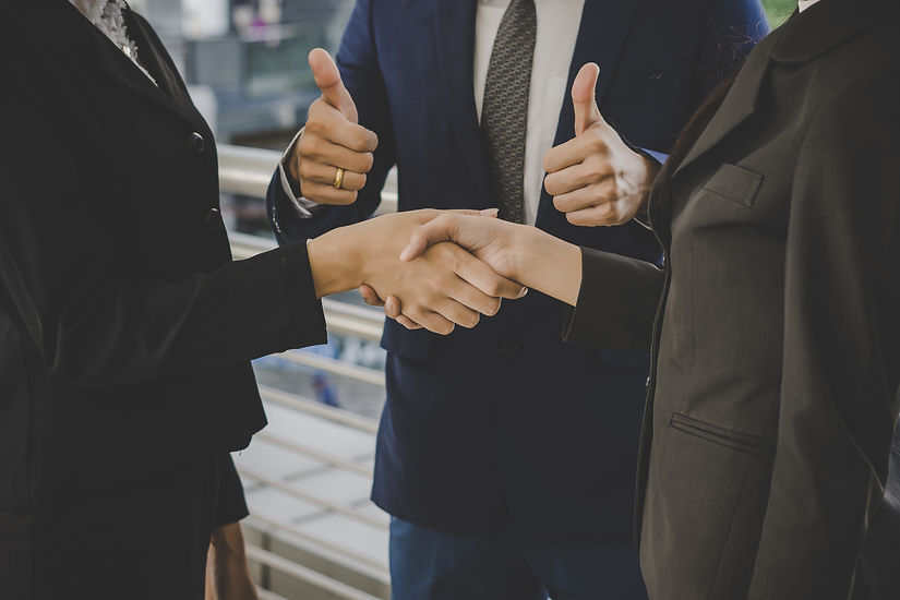 business-people-shaking-hands-finishing-up-meeting-deals-business-concept.jpg