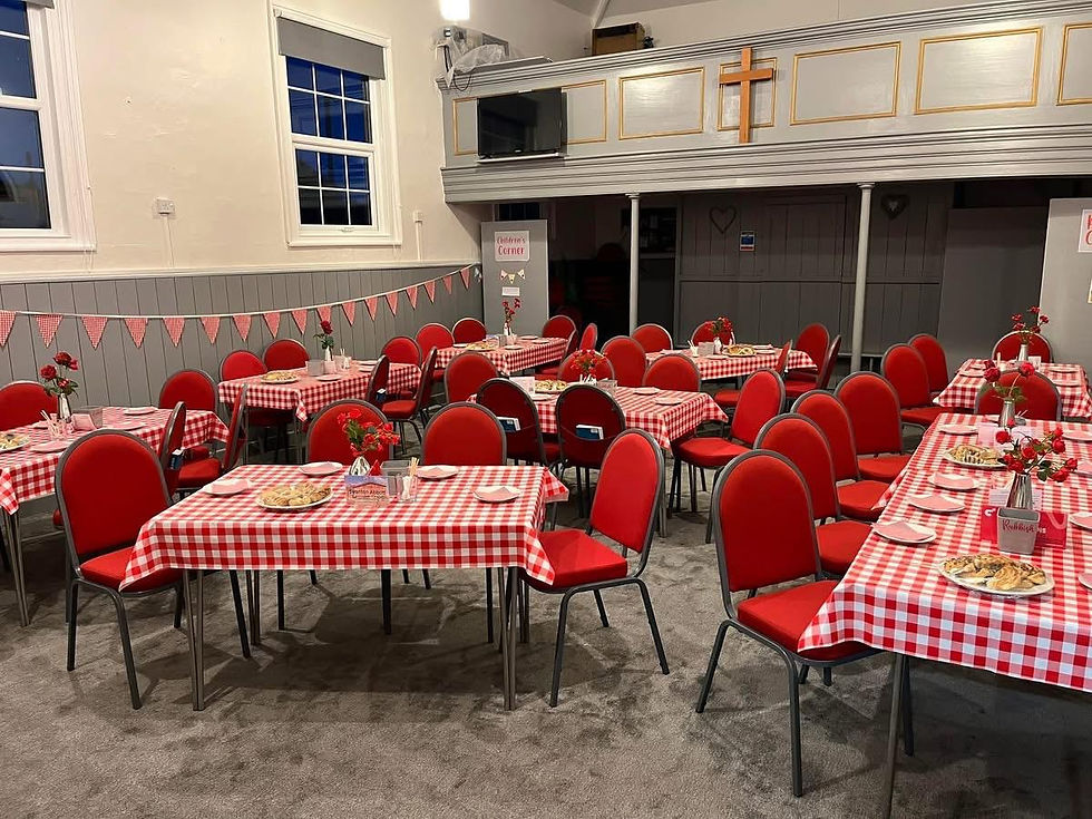 Photo of church layed out with tables and chairs