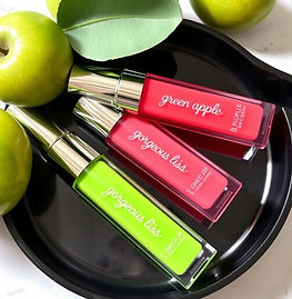 Delicious Green Apple Lip Glosses by Gorgeous Lisa Glosses in a lip gloss tray.jpg