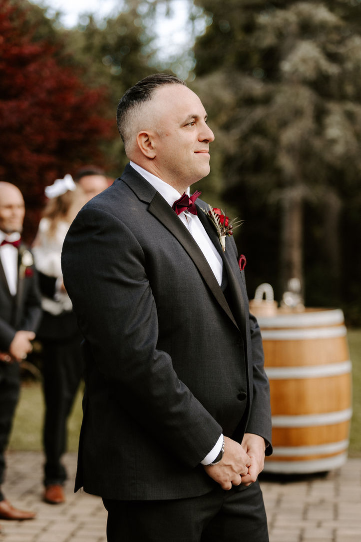 Groom waiting for his bride at the alter for their wedding in new hampshire