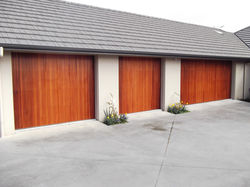 3x vertical cedar sectional door