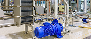 metalic plate in heat exchange machine and pump in the food industrial plant.jpg