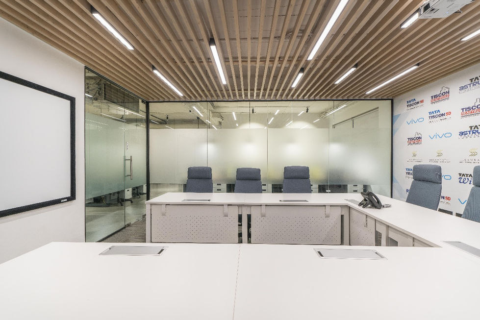 a conference room with a phone on the table
