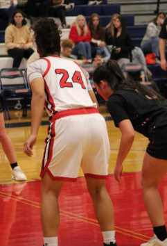 Shoot and Score // Waiting for the best shot, the Coronado Cougars in the height of the action, prepared to win. This match is great practice and application of their skills. (Photo courtesy of Bryn Norris).