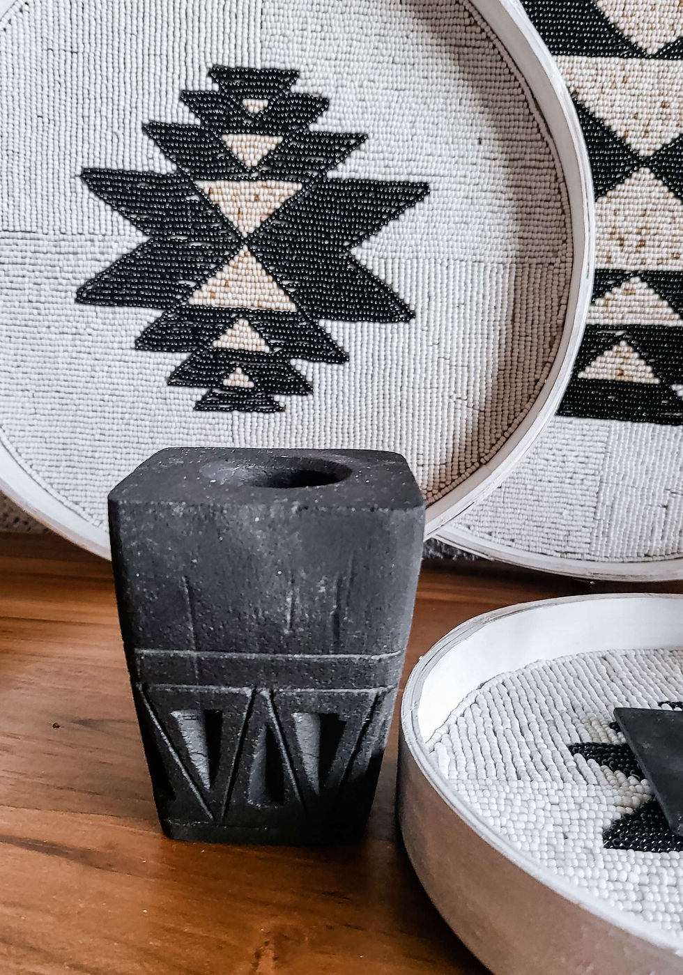 Thumbnail: Watu Sumba stone candle holder in natural and black 