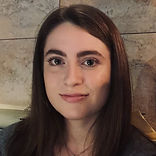 The author Elena Menchetti of the article:"The Pros and Cons of Sustainable Traveling and Tourism".