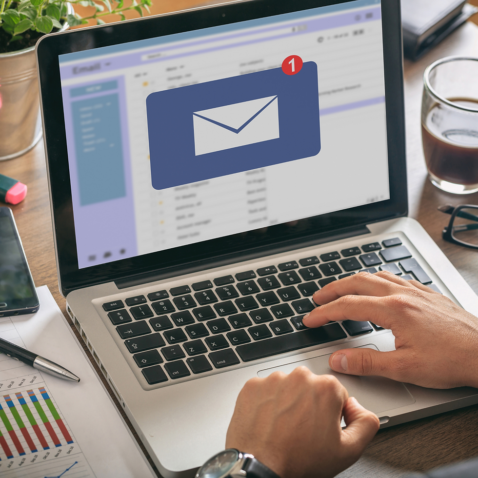 An email popup on a laptop.