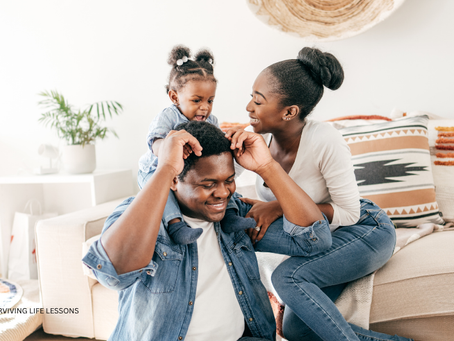 A joyful family shares laughter and playtime at home, capturing a tender moment of love, connection, and togetherness.